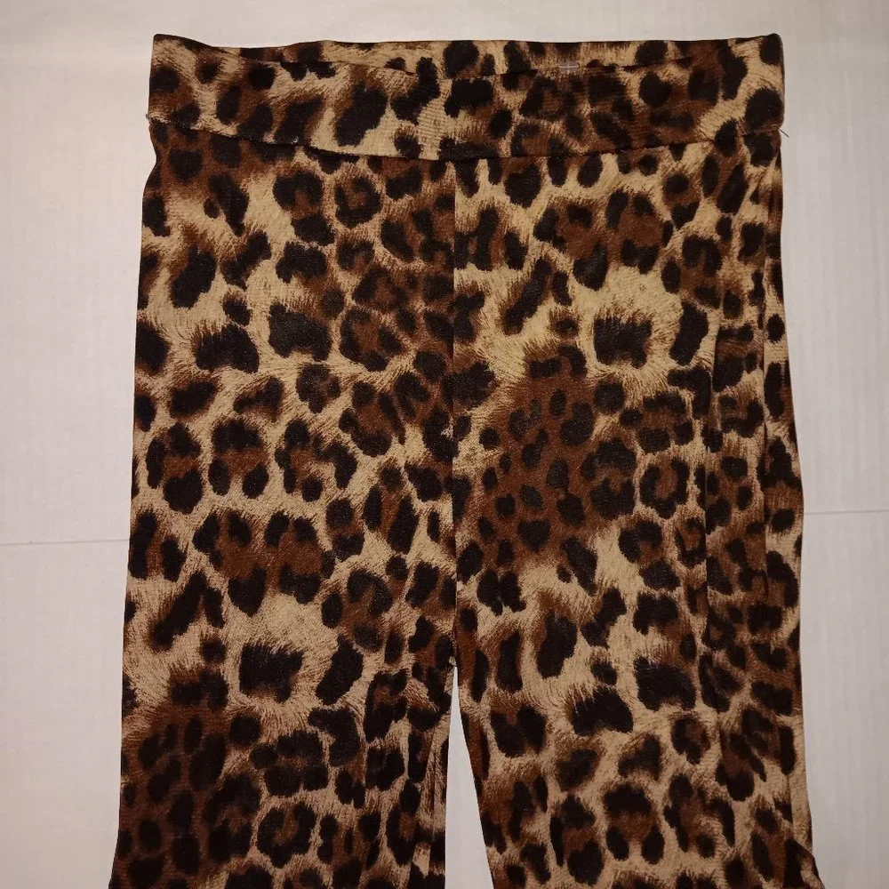 FASHION NOVA SHEER FLARE LEG ANIMAL PRINT PANTS SIZE SMALL